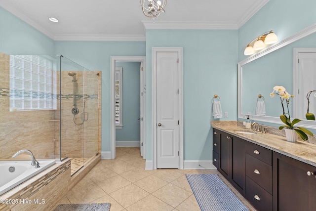 712 Tanbridge Rd, Wilmington, NC 28405 - full bath featuring vanity, a shower stall, a bath, tile patterned flooring, and crown molding