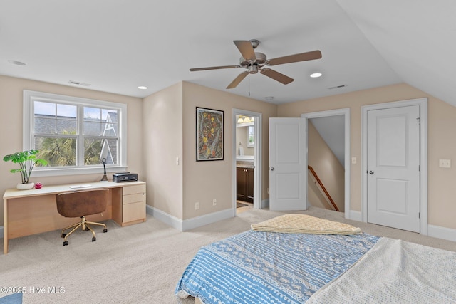 712 Tanbridge Rd, Wilmington, NC 28405 - bedroom with light colored carpet, baseboards, a desk, connected bathroom, and a ceiling fan
