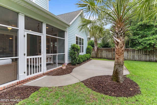 712 Tanbridge Rd, Wilmington, NC 28405 - view of yard with a sunroom and a patio