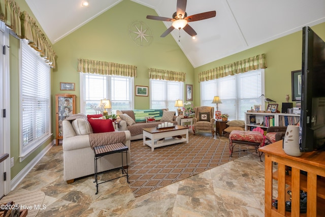 844 E Darden Rd, Faison, NC 28341 - living area featuring high vaulted ceiling, plenty of natural light, stone finish flooring, and a ceiling fan
