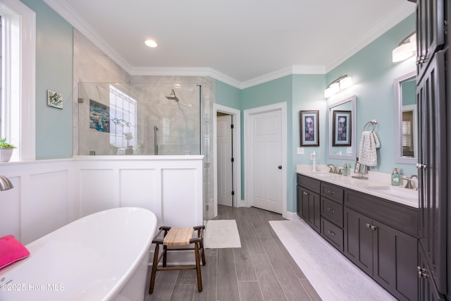 844 E Darden Rd, Faison, NC 28341 - bathroom with a shower stall, a soaking tub, double vanity, ornamental molding, and recessed lighting