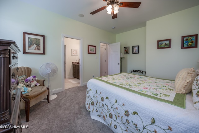 844 E Darden Rd, Faison, NC 28341 - carpeted bedroom featuring ensuite bathroom, baseboards, and a ceiling fan