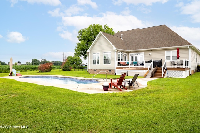 844 E Darden Rd, Faison, NC 28341 - back of property featuring crawl space, a wooden deck, a patio area, an outdoor pool, and a yard
