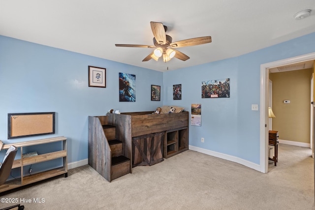 605 Stagecoach Dr, Jacksonville, NC 28546 - carpeted bedroom featuring baseboards and ceiling fan
