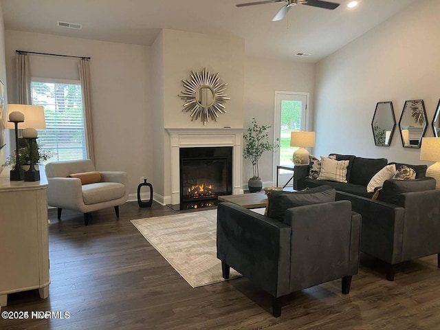 1217 Pelican Dr, New Bern, NC 28560 - living area featuring ceiling fan, dark wood-style floors, a glass covered fireplace, baseboards, and recessed lighting