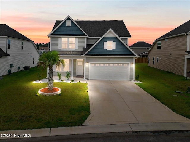 5735 Orchardgrass Rd, Leland, NC 28451 - traditional home with driveway, a front lawn, central air condition unit, and a shingled roof