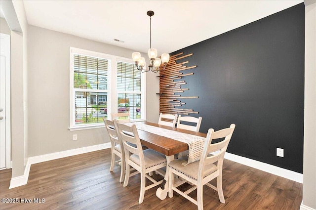 5735 Orchardgrass Rd, Leland, NC 28451 - dining room featuring a chandelier, baseboards, and wood finished floors