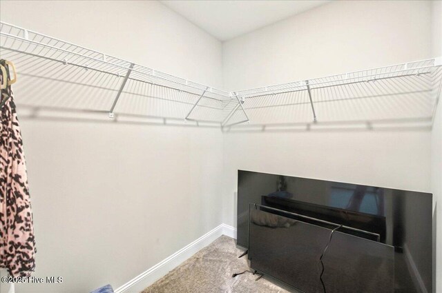 5735 Orchardgrass Rd, Leland, NC 28451 - spacious closet featuring light carpet