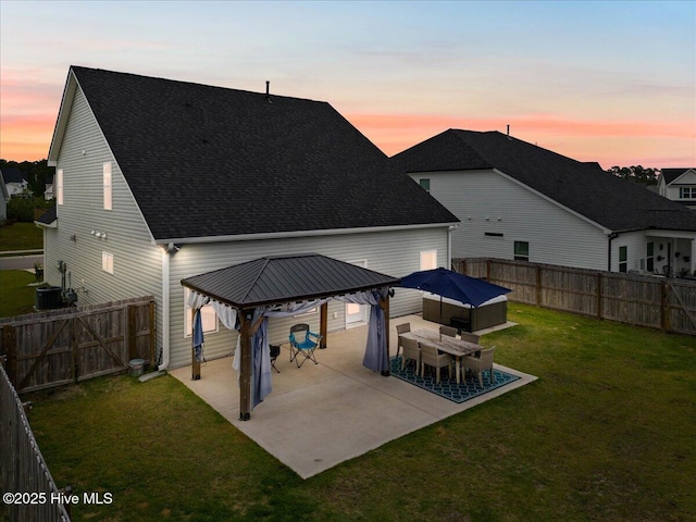 5735 Orchardgrass Rd, Leland, NC 28451 - rear view of property with a gazebo, a shingled roof, a patio area, and central AC
