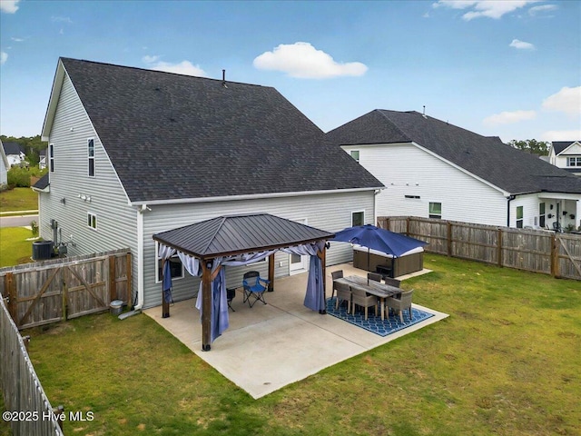 5735 Orchardgrass Rd, Leland, NC 28451 - rear view of property featuring a gazebo, roof with shingles, a patio, and central AC