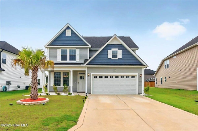 5735 Orchardgrass Rd, Leland, NC 28451 - view of front facade featuring driveway and a front yard