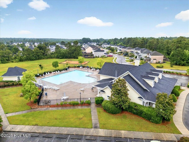 5735 Orchardgrass Rd, Leland, NC 28451 - aerial perspective of suburban area featuring a pool