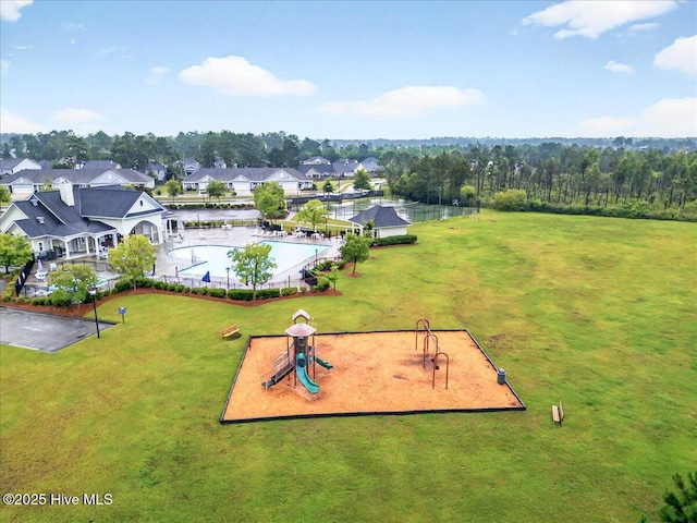 5735 Orchardgrass Rd, Leland, NC 28451 - aerial perspective of suburban area with a pool area