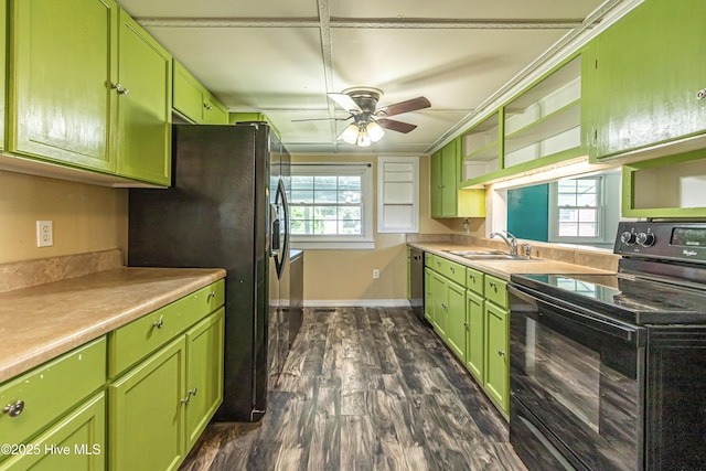 105 Queens Rd, Jacksonville, NC 28540 - kitchen featuring black appliances, green cabinets, a sink, open shelves, and dark wood-type flooring