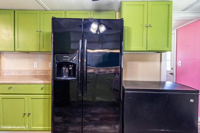 105 Queens Rd, Jacksonville, NC 28540 - kitchen with black fridge with ice dispenser and green cabinetry