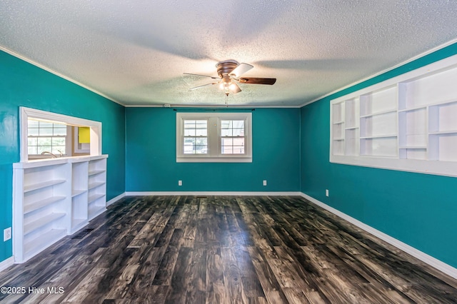 105 Queens Rd, Jacksonville, NC 28540 - unfurnished room featuring ceiling fan, a textured ceiling, plenty of natural light, ornamental molding, and dark wood-style flooring