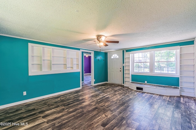 105 Queens Rd, Jacksonville, NC 28540 - foyer with wood finished floors, baseboards, a ceiling fan, and a textured ceiling