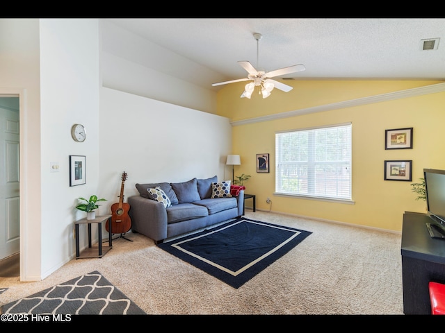4043 Brick Path Ln SE, Southport, NC 28461 - living room featuring lofted ceiling, a ceiling fan, carpet flooring, and baseboards