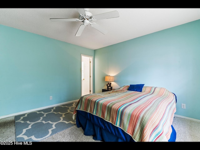 4043 Brick Path Ln SE, Southport, NC 28461 - carpeted bedroom with baseboards and ceiling fan
