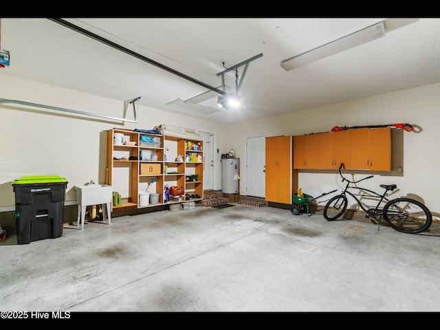 4043 Brick Path Ln SE, Southport, NC 28461 - garage with electric water heater and a garage door opener
