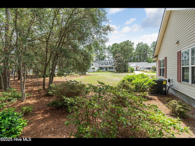 4043 Brick Path Ln SE, Southport, NC 28461 - view of yard featuring central AC