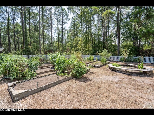 4043 Brick Path Ln SE, Southport, NC 28461 - view of yard featuring a vegetable garden
