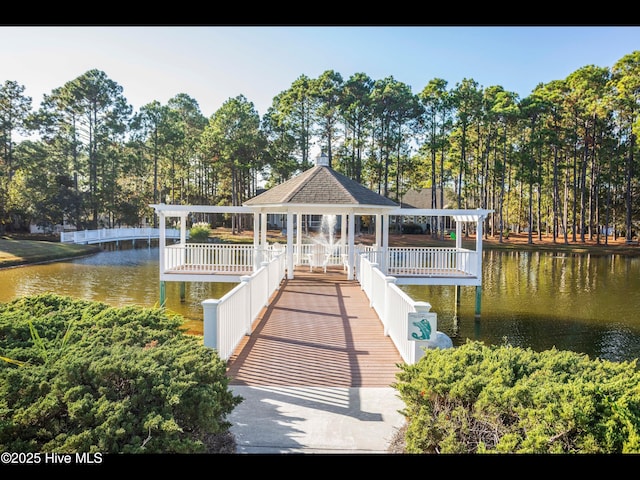 4043 Brick Path Ln SE, Southport, NC 28461 - dock with a gazebo, a water view, and view of wooded area