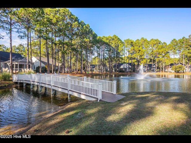 4043 Brick Path Ln SE, Southport, NC 28461 - dock area featuring a water view and a yard