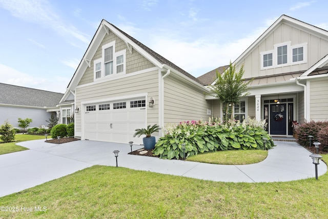 3020 Eno Ln, Leland, NC 28451 - craftsman-style home with driveway, board and batten siding, a front lawn, and an attached garage
