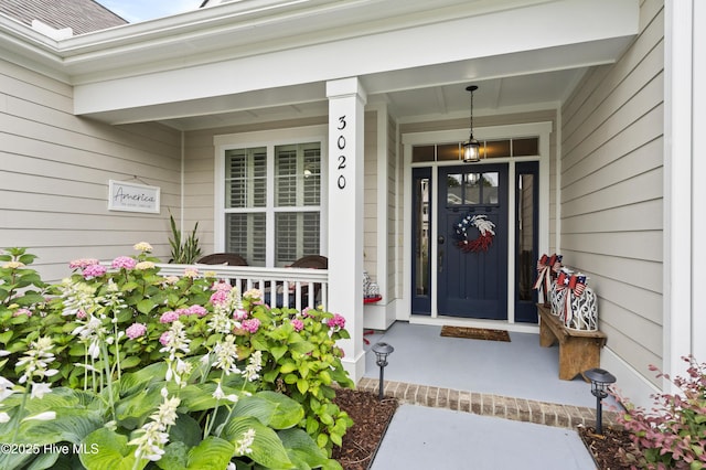 3020 Eno Ln, Leland, NC 28451 - entrance to property with a porch