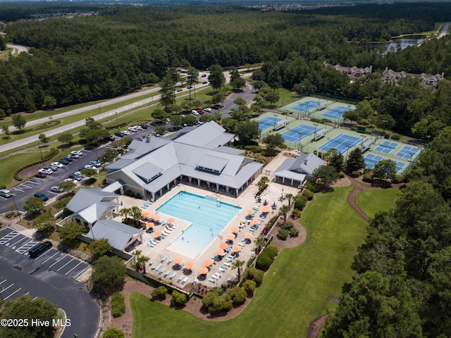 3020 Eno Ln, Leland, NC 28451 - drone / aerial view of a heavily wooded area and a pool area