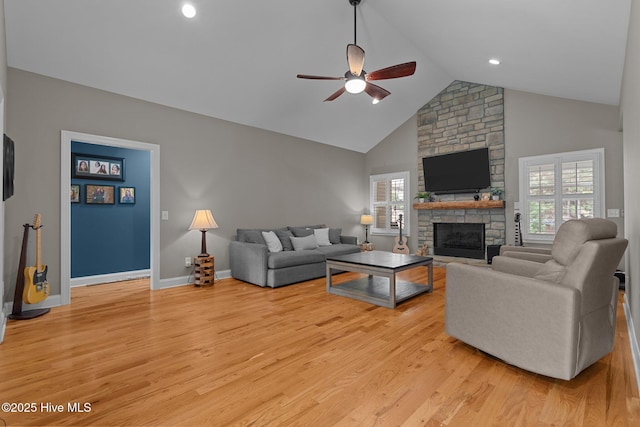 195 Devonshire Ave W, Seven Lakes, NC 27376 - living area with ceiling fan, light wood-style flooring, a fireplace, baseboards, and high vaulted ceiling