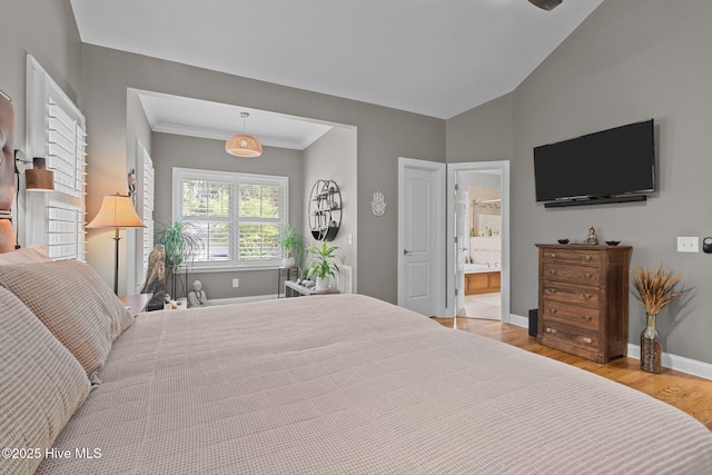 195 Devonshire Ave W, Seven Lakes, NC 27376 - bedroom featuring light wood-type flooring, baseboards, ensuite bathroom, and crown molding