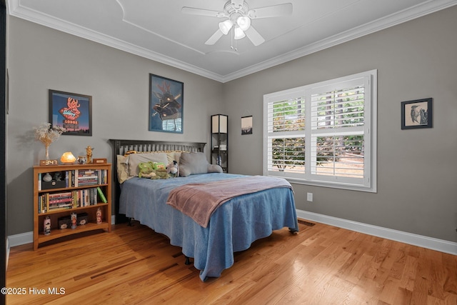 195 Devonshire Ave W, Seven Lakes, NC 27376 - bedroom with crown molding, light wood-style flooring, baseboards, and ceiling fan