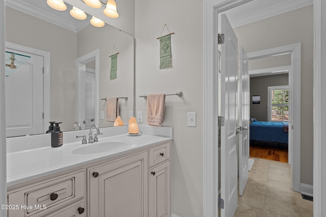 195 Devonshire Ave W, Seven Lakes, NC 27376 - ensuite bathroom featuring vanity, crown molding, and baseboards