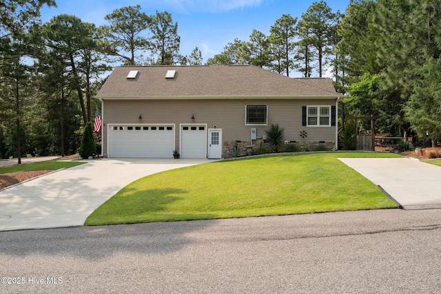 195 Devonshire Ave W, Seven Lakes, NC 27376 - view of front of home with driveway, a front lawn, a shingled roof, and an attached garage