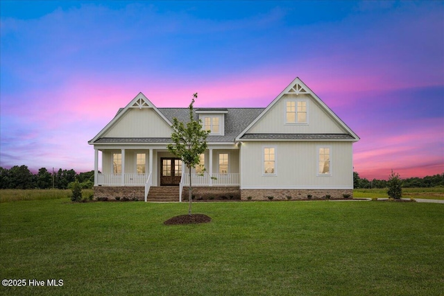 2259 Heartland Rd, Battleboro, NC 27809 - view of front of property with crawl space, a yard, a porch, and a shingled roof