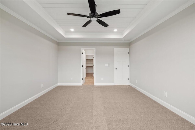 2259 Heartland Rd, Battleboro, NC 27809 - unfurnished bedroom featuring carpet floors, a raised ceiling, baseboards, recessed lighting, and crown molding