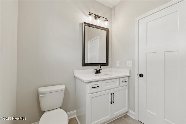2259 Heartland Rd, Battleboro, NC 27809 - half bath featuring vanity, toilet, and baseboards
