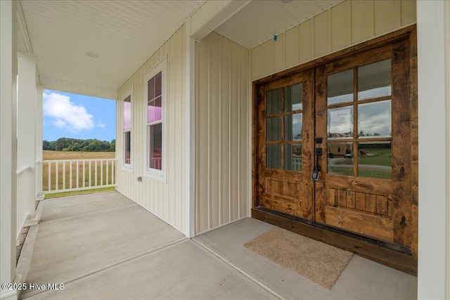 2259 Heartland Rd, Battleboro, NC 27809 - view of exterior entry featuring french doors and covered porch