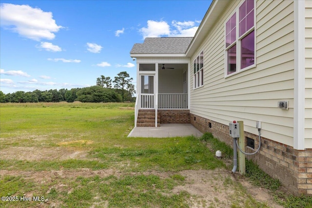 2259 Heartland Rd, Battleboro, NC 27809 - view of grassy yard with ceiling fan, a sunroom, and a patio area