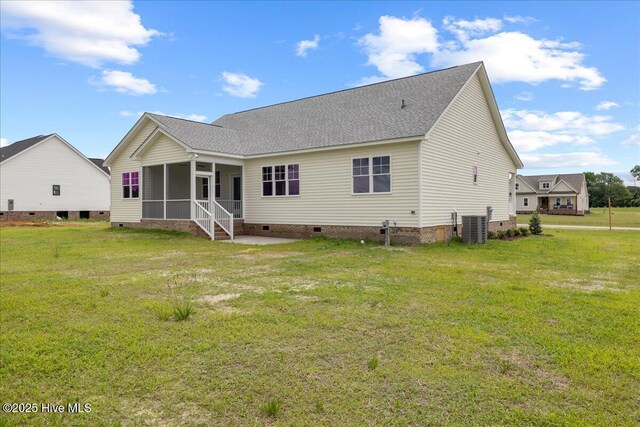 2259 Heartland Rd, Battleboro, NC 27809 - back of property with crawl space, a sunroom, a yard, central AC, and a shingled roof
