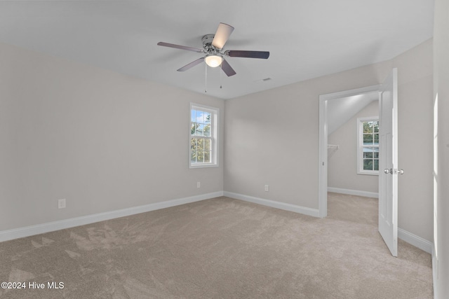 355 N Gaines St, Southern Pines, NC 28387 - spare room with carpet floors, healthy amount of natural light, baseboards, and ceiling fan