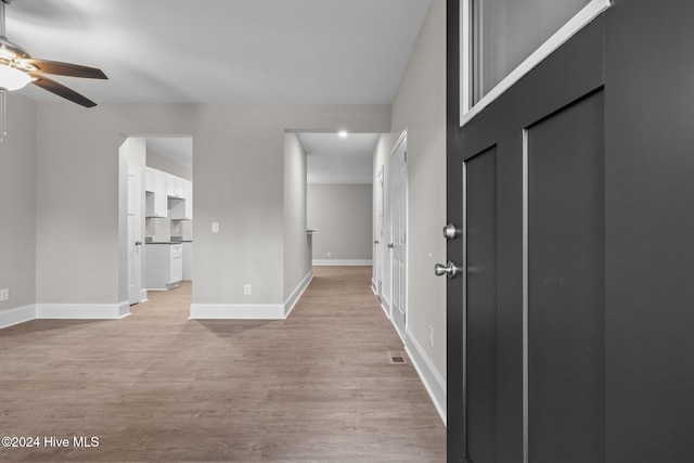 355 N Gaines St, Southern Pines, NC 28387 - empty room featuring light wood-type flooring, ceiling fan, and baseboards