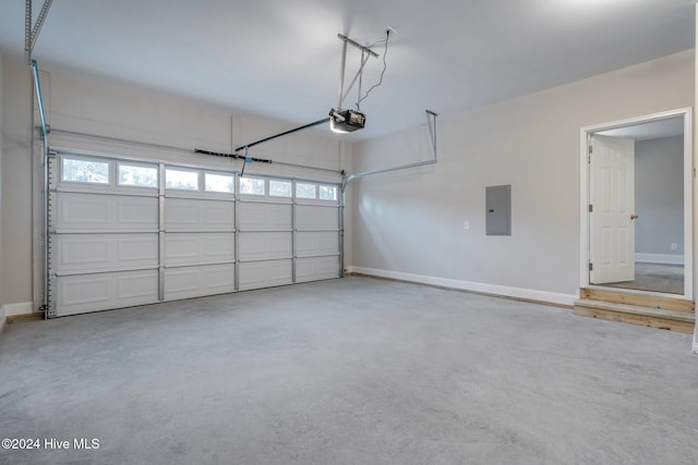 355 N Gaines St, Southern Pines, NC 28387 - garage with electric panel, baseboards, and a garage door opener
