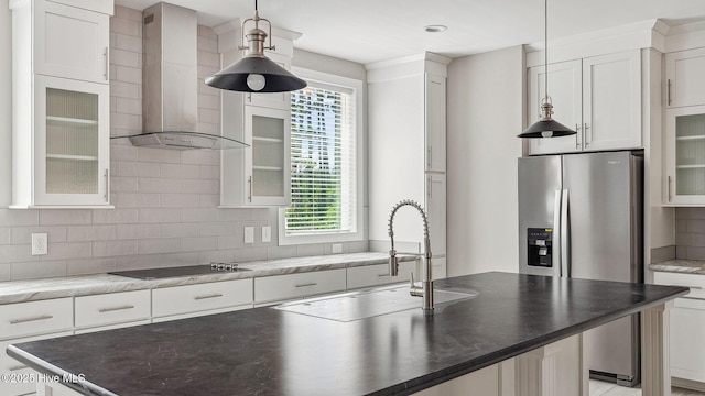 290 Boulder Dr, West End, NC 27376 - kitchen featuring wall chimney range hood, black electric cooktop, decorative backsplash, and a sink