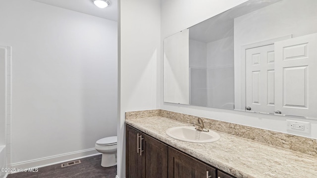 290 Boulder Dr, West End, NC 27376 - bathroom with vanity, toilet, and baseboards