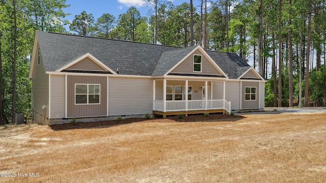 290 Boulder Dr, West End, NC 27376 - view of front of home featuring crawl space, covered porch, central AC unit, and a shingled roof