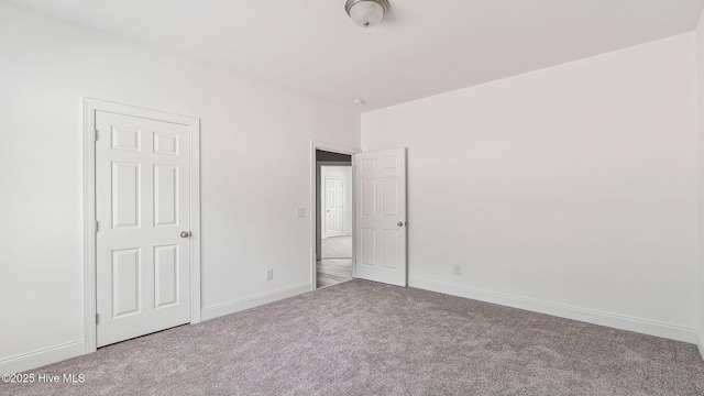 290 Boulder Dr, West End, NC 27376 - unfurnished bedroom with carpet and baseboards