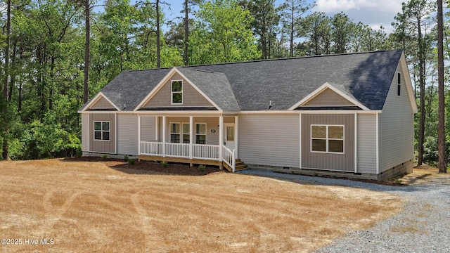 290 Boulder Dr, West End, NC 27376 - view of front facade featuring crawl space, covered porch, and roof with shingles